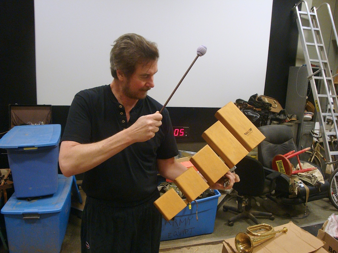 Foley artist Dan O’Connell prepares to give Curly a knock on the head, courtesy of a temple block. Photo: Matt Hurwitz.