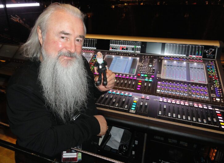 U2's sound director, Joe O'Herlihy, with his DiGiCo SD7 console and a mini doppelganger: “There’s a guy on the crew here that makes them; it’s pretty cool, alright!”