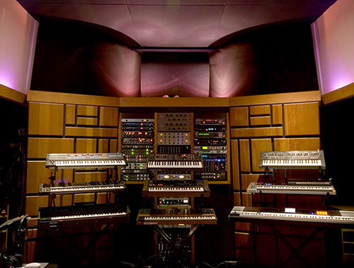 The most recent addition, Studio C, with keyboards set up in the control room.