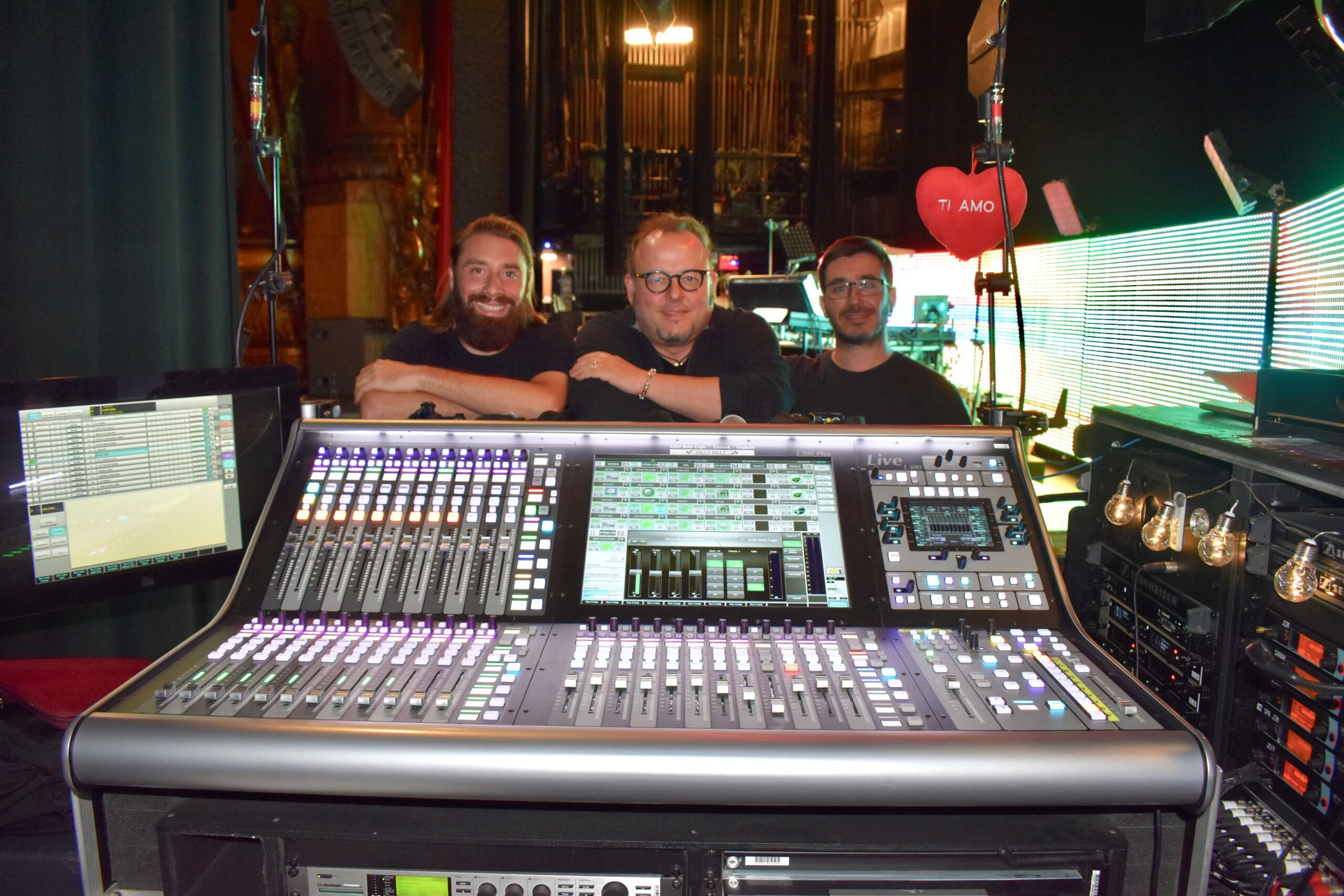 The audio team behind Simple Minds’ U.S. tour, seen here with the SSL desk in monitorworldinside New York City’s Beacon Theatre, included (l-r) Mikey Gibbard, monitor engineer; Oliver Gerard, FOH engineer; and Dan Ibanez, audio chief. Photo: Clive Young.