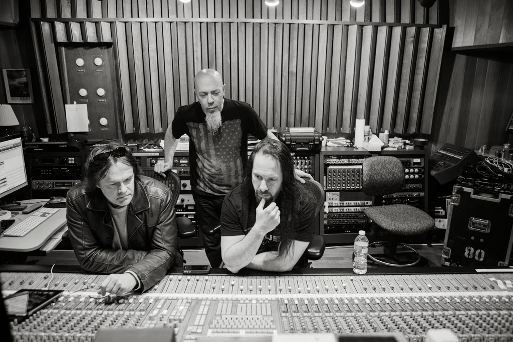Engineer Richard Chycki, left, with producer/guitarist John Petrucci and keyboardist Jordan Rudess (standing) in the control room at Cove City.