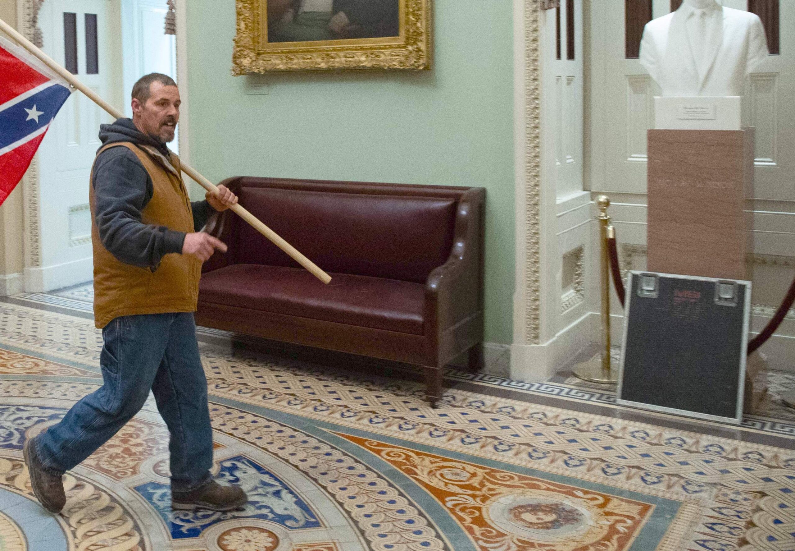 Rioters who broke into the US Capitol on January 6, 2021 used a looted Maryland Sound International rack lid (seen on right) as a shield/weapon before abandoning it. Photo: Saul Loeb/AFP via Getty Images.