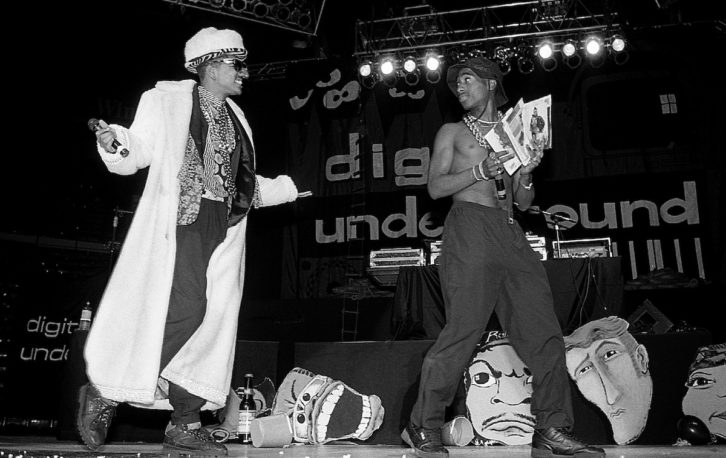 Digital Underground rapper/producer Gregory Jacobs, AKA “Humpty Hump” (left) and the group's then-roadie/dancer Tupac Shakur performing at Indianapolis’ Market Square Arena in July, 1990. PHOTO: Raymond Boyd/Getty Images.