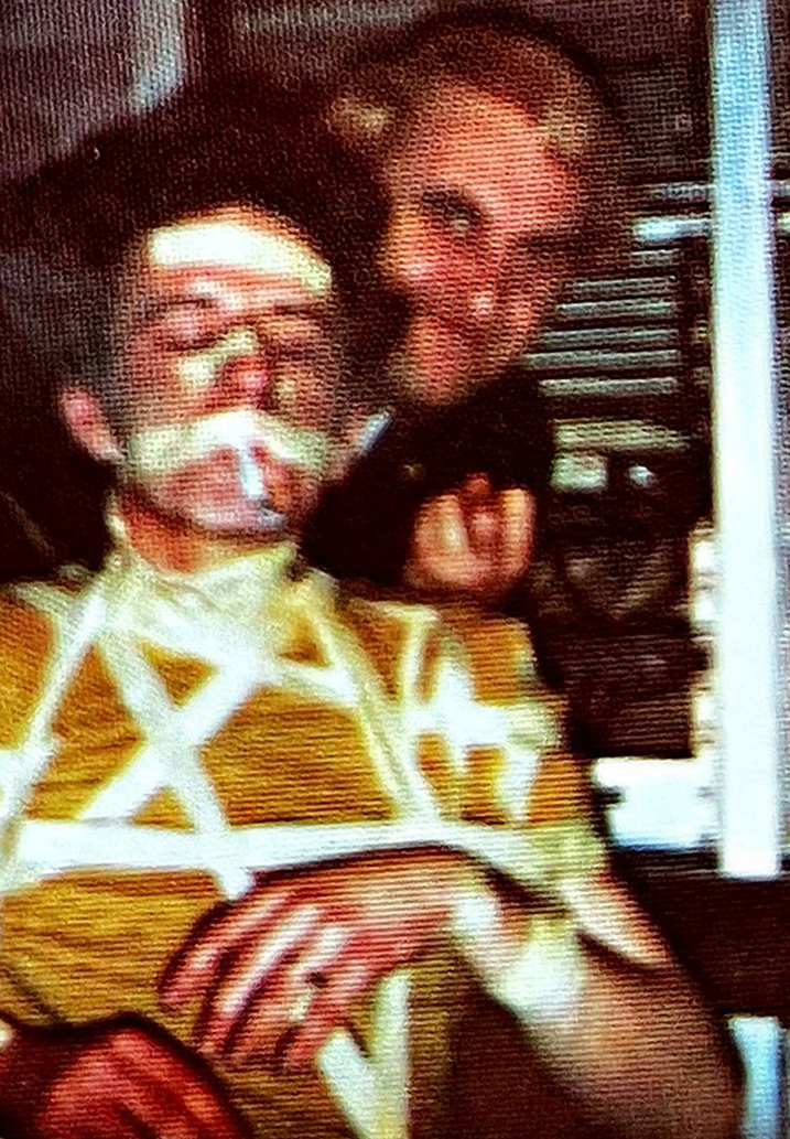 Bob Sargeant and a taped-up Andy Cox (later of Fine Young Cannibals) in a detail on the cover of English Beat's Wha’ppen album.