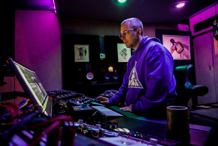 Gudwin, seen from front and rear, in his Dolby Atmos mix studio within Henson Studios.