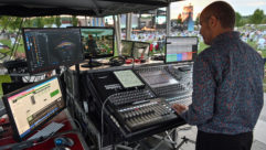 Sound designer and FOH engineer Jonathan Burke at the productions’ DiGiCo SD10 mixing console and L-ISA Controller display (upper left).