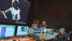 The re-recording team for the Oscar-winning Sound of Metal at Estudio AstroLX’s SSL C3048 console. In back, owner Jaime Baksht; seated, his re-recording partner Michelle Couttolenc. Courtesy of Estudio AstroXL.