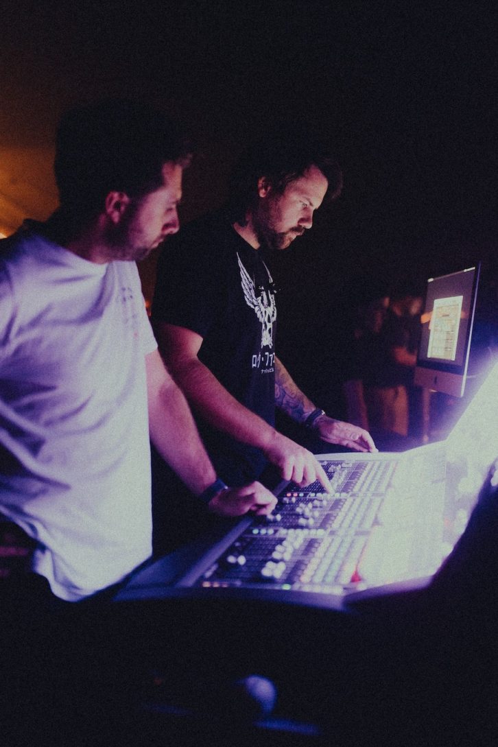 FOH engineer Danny Harvey working with vocalist – and MON engineer - Caleb Shomo. Photo: Wyatt Clough.