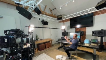 Composer Joseph Trapanese in his studio, surrounded by his Dolby Atmos-capable 7.1.4 speaker system of JBL Pro speakers.