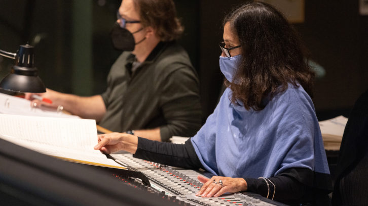 Composer Germaine Franco at the console on the Newman Scoring Stage at Fox Studios, with Dave Giuli, Supervising Orchestrator, to her right.