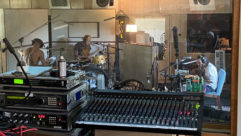 Recording live in the studio, from left: Flea, Chad Smith and John Frusciante. Photo: Ryan Hewitt.