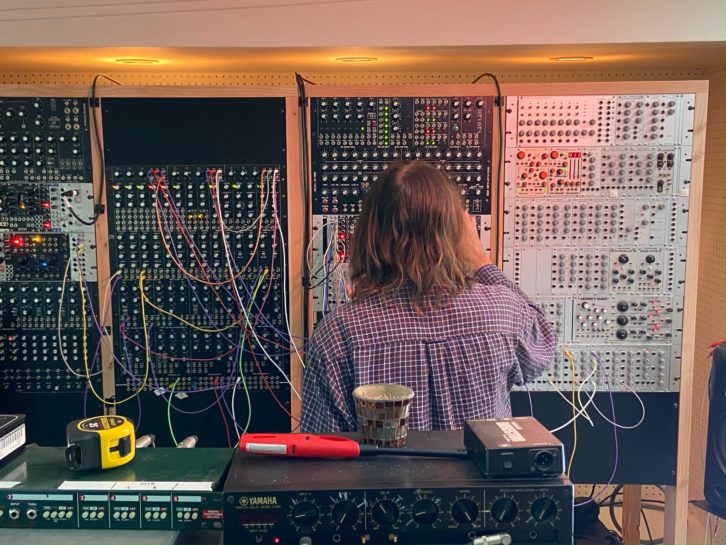 Two sides of John John Frusciante, working with modular analog synths for 'Unlimited Love.' Photo: Ryan Hewitt.