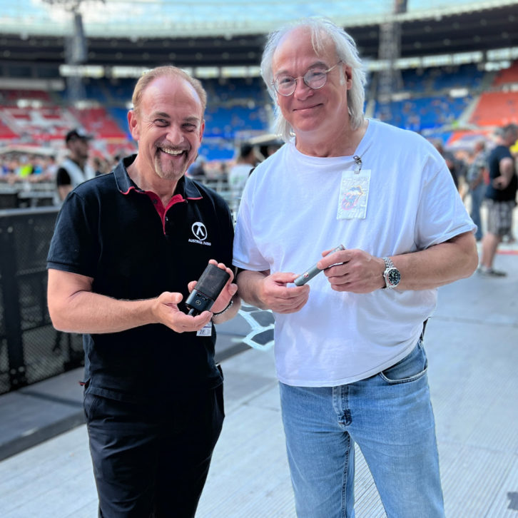  Martin Seidl, CEO of Austrian Audio, holding a OC18, with David Natale, FOH engineer for The Rolling Stones