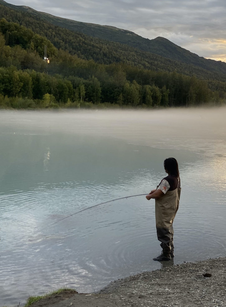 A local fishing for salmon in Eklutna Tailrace.