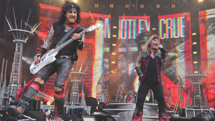 Nikki Sixx (left) and Vince Neil hear themselves through JH Audio Sharona in-ears on Shure PSM 1000 wireless packs. Photo: Kevin Mazur/Getty Images