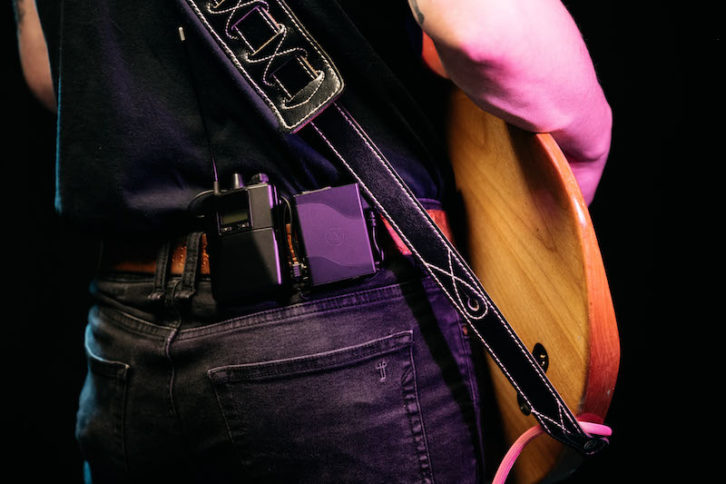 The updated bodypack includes a jumper cable to connect to wireless IEM receivers, and the Bluetooth-enabled ASI Audio App for control.