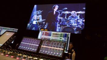 The Avid S6 display module showing panning information for the Dolby Atmos mix. Just behind it is the Mix Window, highlighting various instrument track groups, with Billy Joel in 4K on the projector perf-screen. PHOTO: Kim Farrell