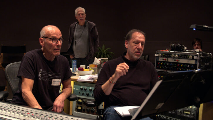 Engineer Rich Breen looks over both charts and Pro Tools screens at the Neve console in Capitol Studio A, with, from left, Russell Ferrante, Bob Mintzer and Dane Alderson (peeking over the rack at rear-right).