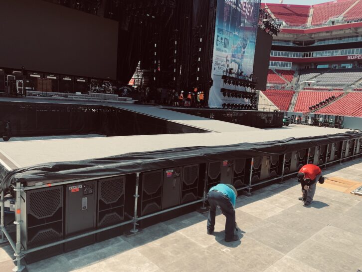 Moving the subwoofers from beneath the stage to in front of the stage thrust greatly reduced sub energy onstage for the band, while adding excitement for the audience directly in front of Kenny Chesney.