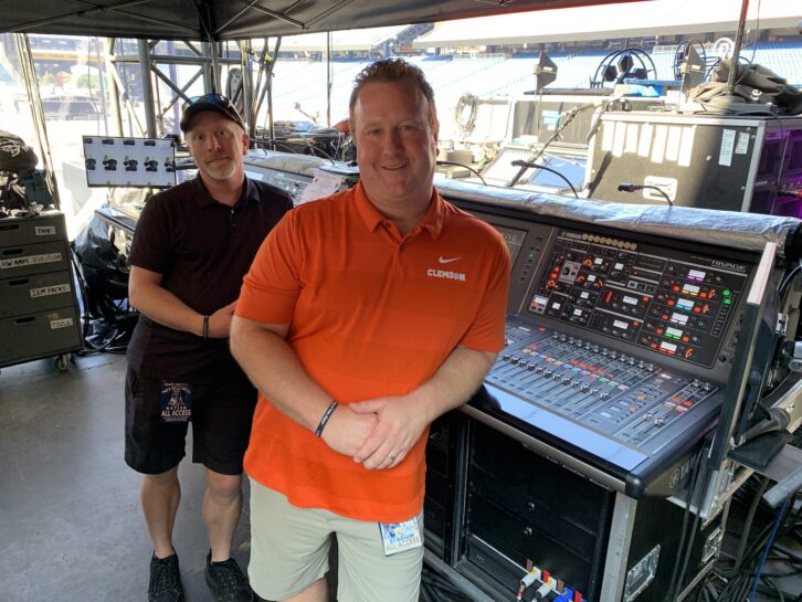 Monitor engineers Phil “SidePhil” Robinson (left) and Bryan “Opie” Baxley used dual Yamaha PM7 desks to provide mixes at stageside.