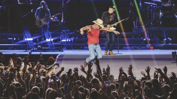 Seen here getting airborne at Nashville’s Nissan Stadium, Kenny Chesney belted nightly into an sE Electronic V7 capsule on a Shure Axient Digital wireless system. PHOTO: Catherine Powell/Getty Images.