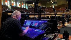 At the Ryman in Nashville, monitor engineer Colten Hyten checks out his Allen & Heath dLive S5000 surface at stageside.