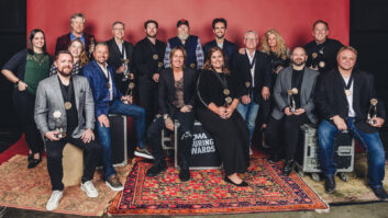 Winners of the 2022 CMA Touring Awards were honored during an industry celebration at Marathon Music Works in Nashville on Monday, Jan. 30. (L – R, back row): Morgan Pitt and Chrissy Hall (Ryman Auditorium), John Huie, John Stalder, Austin Neal, Chris Kappy, Dan Hochhalter, Robert Scovill, Jill Trunnell and Brian O’Connell. (L – R, front row): Michael Zuehsow, David Farmer, Keith Urban, Stephanie Mundy Self, Tyler Hutcheson and Jerry Slone. Photo Credit: Hunter Berry/CMA