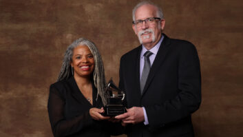 ES President-Elect Leslie Gaston-Bird and AES President Bruce Olson accepted a Technical Grammy Award for the AES.