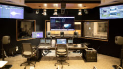 The main mix control room, which is also a 25-seat classroom, at the new Media and Immersive eXperience (MIX) Center, home of The Sidney Poitier New American Film School at Arizona State University, featuring a Dolby 7.1.4 Atmos system composed of Genelec Smart Active Monitors. Photo credit: Qianhui Ma.