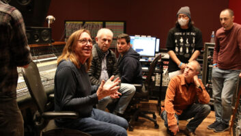 In Studio D, engineers Chuck Ainlay, left, and Elliot Scheiner turn away from the API console to talk to attendees.