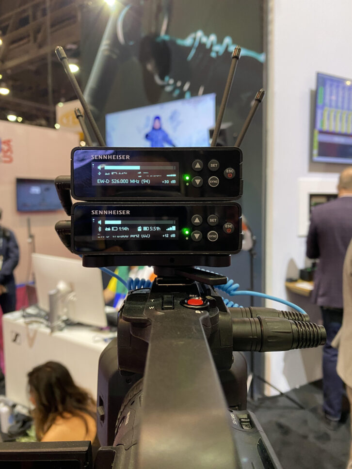 Also at the Sennheiser NAB 2023 booth is the new EW-DP-ME2-SET, which includes a portable digital UHF EW-DP EK receiver, seen here double-stacked on a camera; also in the set are an EW-D SK bodypack transmitter and an ME 2 lavalier microphone. 
