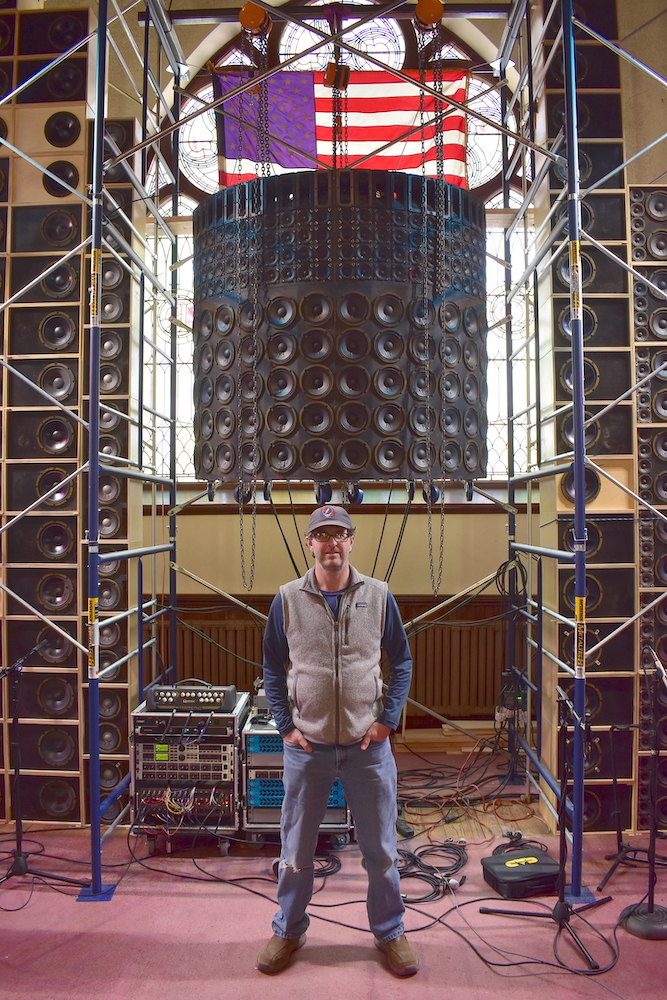 Anthony Coscia with his half-scale Wall of Sound, beneath the curved center cluster used for vocals.