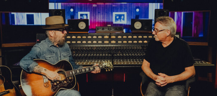 Dave Stewart, left, and John McBride talk about guitars in front of Studio A’s vintage Neve 8078 console.