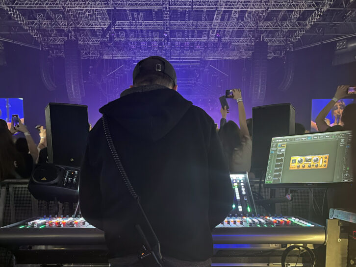 FOH engineer Travis Bing at his SSL L650 console.;