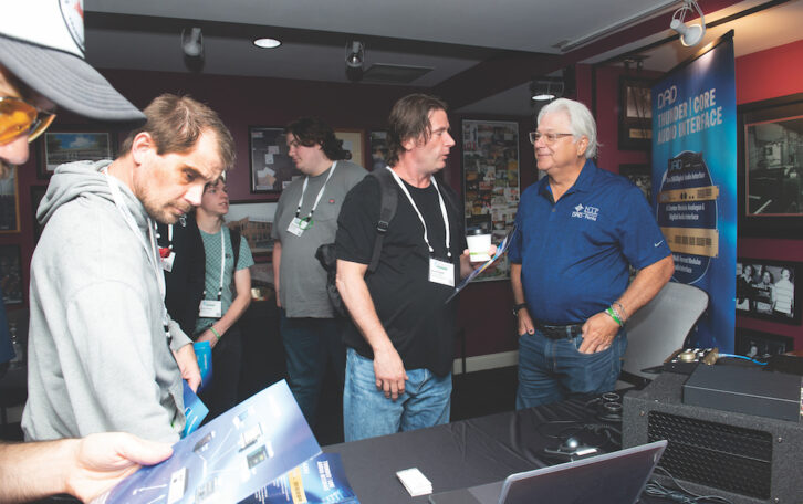 Kurt Howell of NTP Technology (DAD, Penta) talks with attendees at Columbia Studio A.