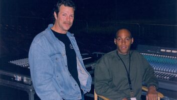 FOH engineer Rich Davis (seated) and monitor engineer Bob Delson manned Yamaha and Ramsa consoles, respectively, for Jimmy Buffett during his winter 1998 arena tour. Photo: Clive Young.