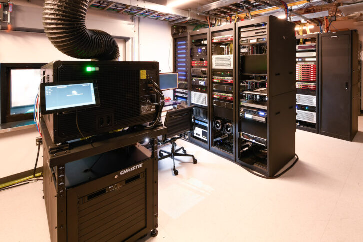 The machine room houses the Christie CP 4440 4K laser projector and racks of Focusrite RedNet units supporting the Dante audio network. Photo: Peter Zakhary.