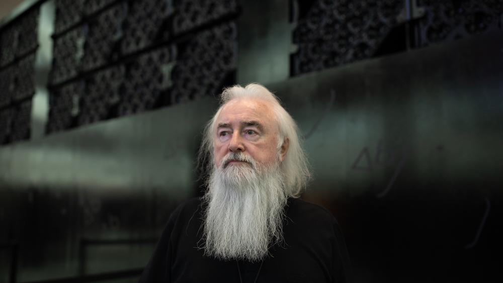 U2 FOH engineer Joe O’Herlihy takes a moment to contemplate the upcoming show in front of one of the many Holoplot X1 matrix arrays behind the stage. Photo: Ross Andrew Stewart