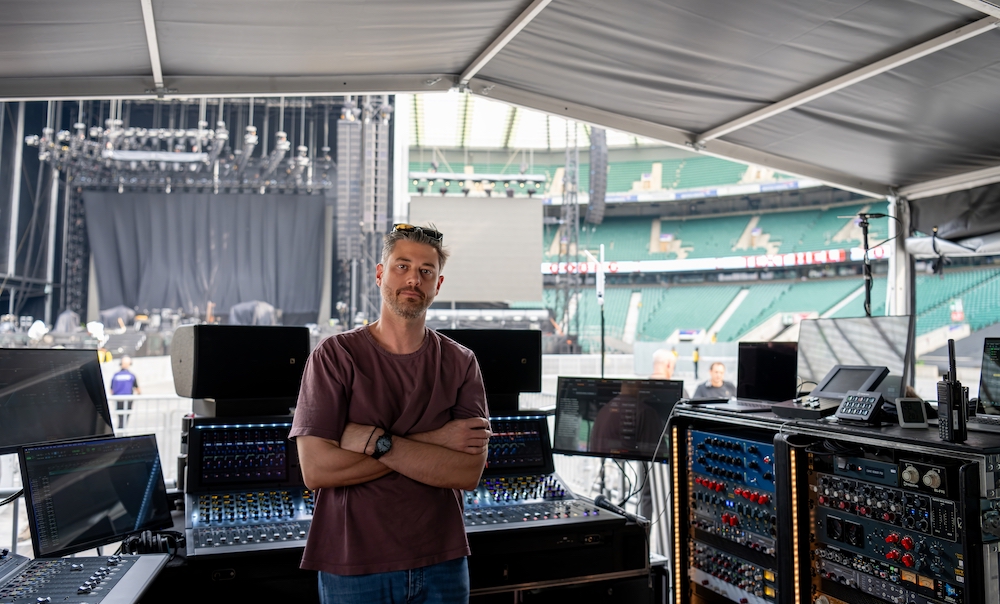 At the FOH mix position, Jamie Pollock presides over an Avid S6L-32D console and copious amounts of outboard gear. Photo: Courtesy of Britannia Row.