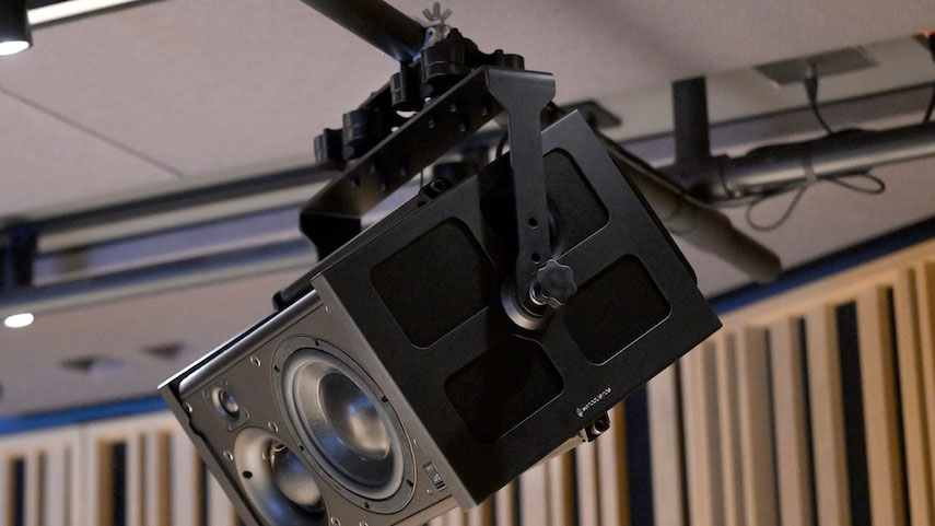 ATC SMC25A monitors, hung from the ceiling via IsoAcoustics V120 ceiling mounts.