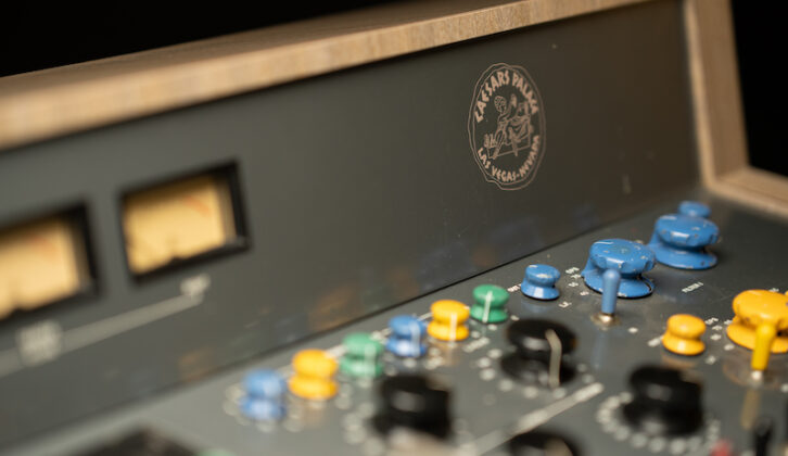 The original insignia highlights part of the desk's history.