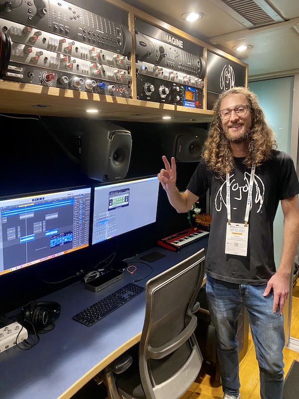 Former Lennon Bus engineer Bryce Quig-Hartman shows off the rear studio. Photo: Clive Young/Future.