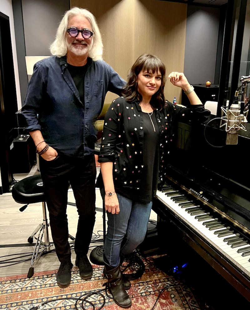 Garrett with Norah Jones for a Spotify Singles session, standing at the same Steinway upright piano she played on her demo sessions 24 years earlier. Photo: Courtesy of William Garrett.