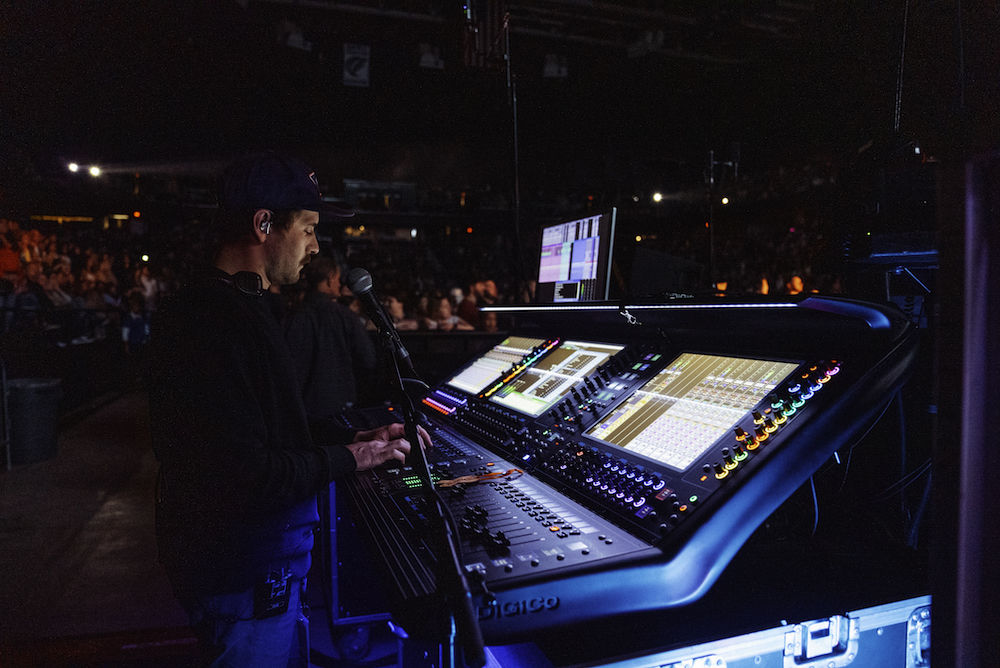 Monitor engineer Jared Green looks after 14 in-ear mixes on his DiGiCo Quantum 338 console at stageside. Photo: Steven Alan.