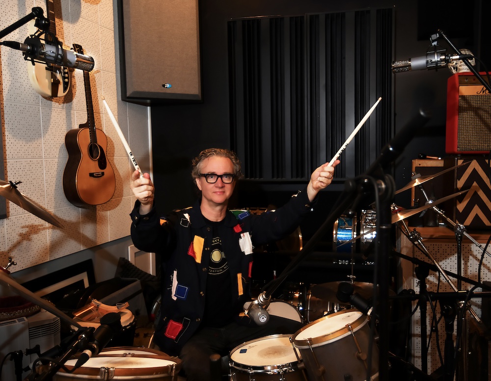 Wells recording drums for the pre-record through a set of Telefunken mics. Photo: David Goggin.