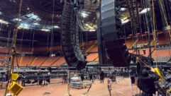 Eighth Day Sound and ATK Audiotek staff hang a donated d&b audiotechnik P.A. at the Kia Forum for FireAid.