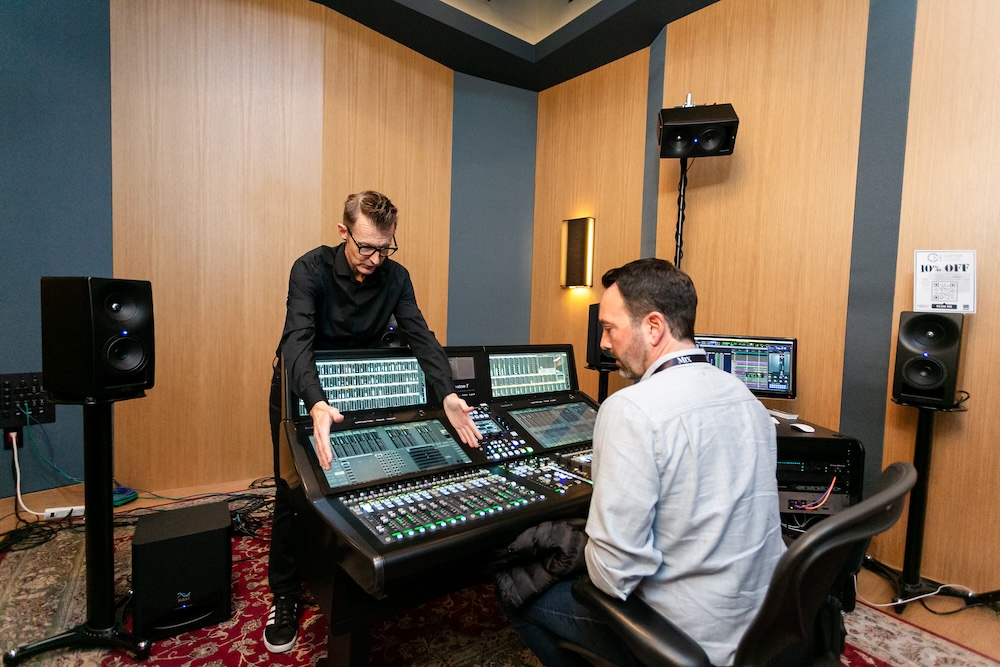 In the Studio 2 live room, SSL’s Phill Scholes takes an attendee through the unique immersive music features built into the System T500 console, with playback from a 7.1.4 rig built and tuned for the day by Kali Audio, featuring SM-5 monitors. Photo: Dajuana Jones.