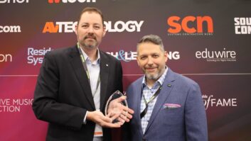 Accepting the award at NAB for Shure were (l-r) Brian Crowley, Director of Sales, and Nelson Arreguin, Event Manager.