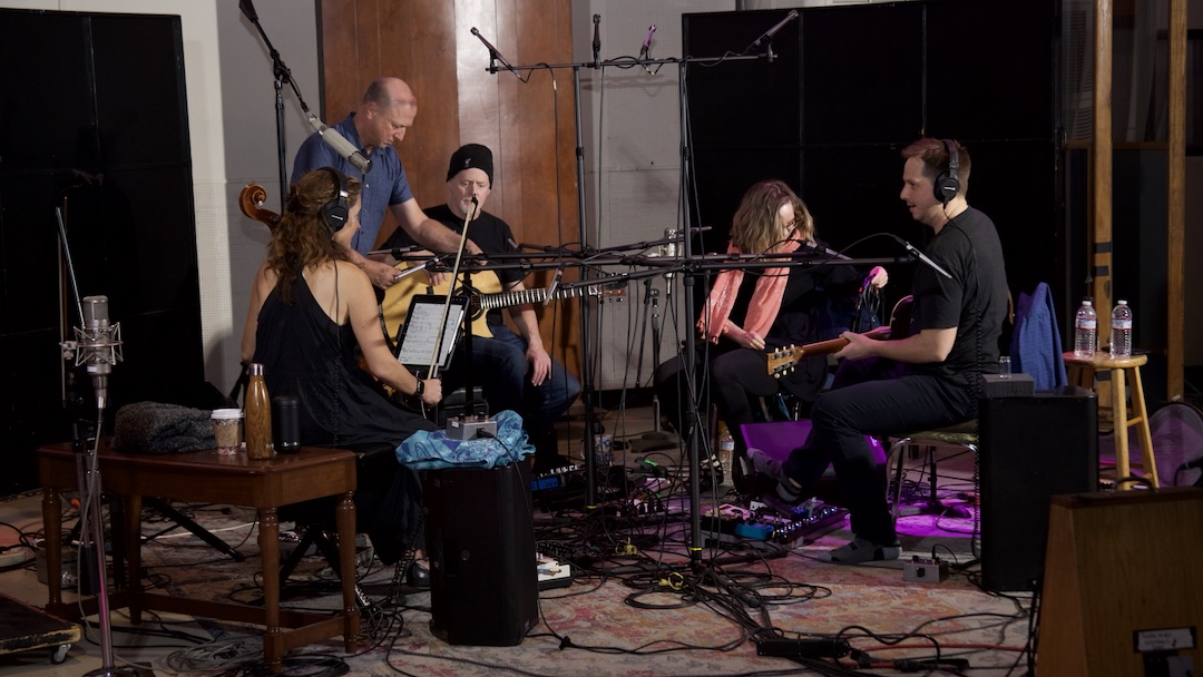 During setup, the musicians were positioned around the immersive microphone array to achieve the optimum balance and separation for recording engineers Matt Wallace and Will Kennedy. From left: Mai Bloomfield, Matt Wallace (standing), Willy Porter, Carmen Nickerson and Ryan Pearl. PHOTO: Adrian Weidmann/Nader Dalloul.