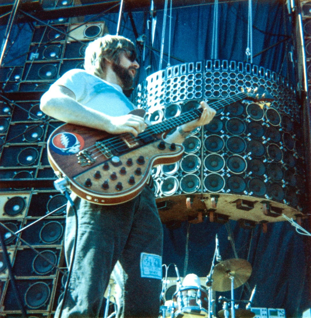 Phil Lesh cuts loose in front of the Wall of Sound. PHOTO: Ed Perlstein/Redferns/Getty Images